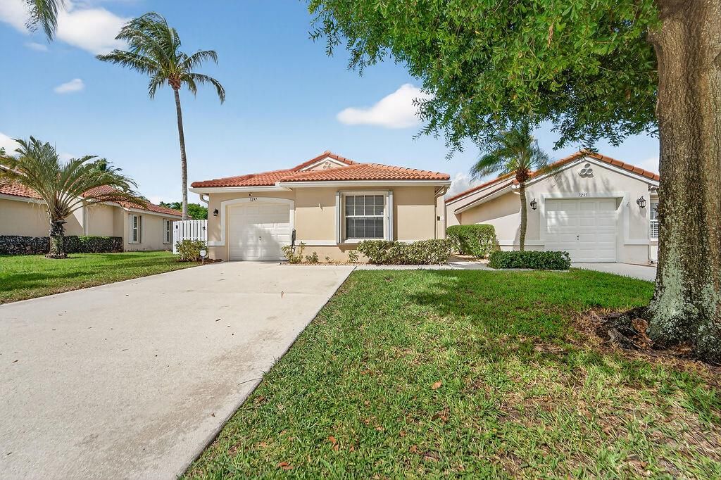 Photo of 7297 Burgess Drive, Lake Worth, FL 33467 (MLS # R11133166)