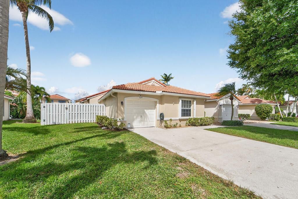 Photo of 7297 Burgess Drive, Lake Worth, FL 33467 (MLS # R11133166)