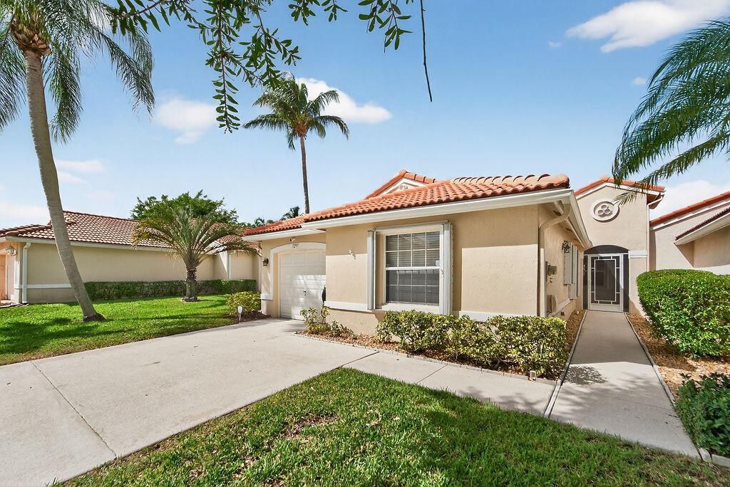 Photo of 7297 Burgess Drive, Lake Worth, FL 33467 (MLS # R11133166)