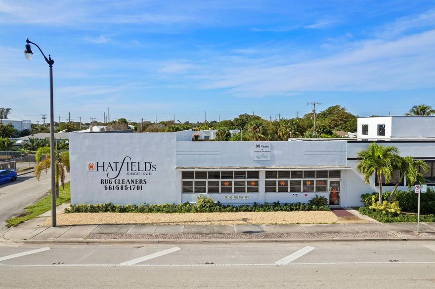 $2.3M w/out rug cleang business OR $3.8M w/rug business. Location & Opportunity to own a corner property w/ great signage viewable by thousands driving by daily, guest parking lot, and is an established, highly known rug cleaning business that has been operating for almost a century. General commercial zoning. Ceiling heights 13' and 15' (Can build up to 30' height), 1 half bath, storage, 2 roll up doors, wall in common, entrance on S Dixie Hwy. Very favorable area to keep the existing thriving business or for an Art Studio, Offices, Antique Shop, Design Store and much more. Minutes to Palm Beach Island, Downtown West Palm Beach, in the South of Southern corridor. Nearby great restaurants, antique row and the art and design district.