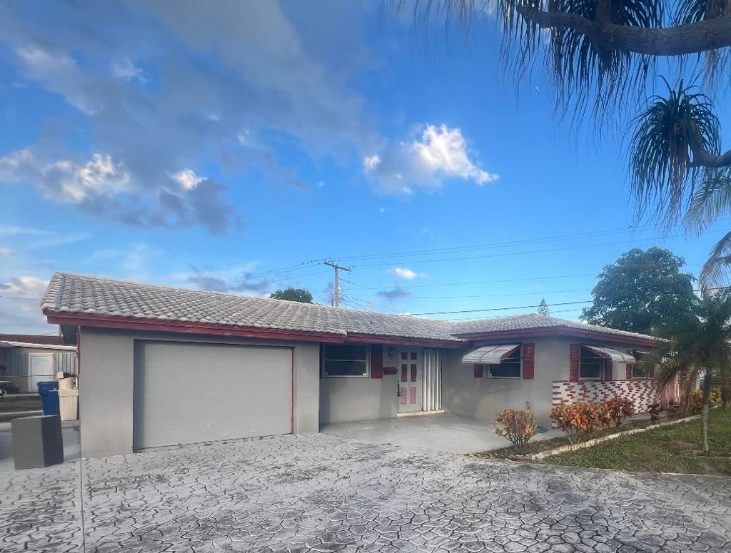 Photo of 490 W 31st Street, Riviera Beach, FL 33404 (MLS # R11147708)