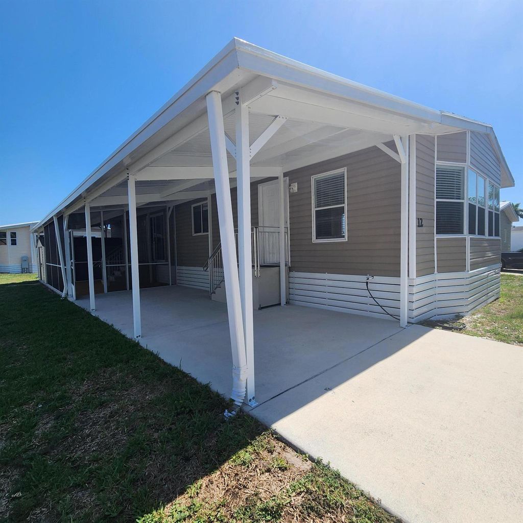 Photo of 12 Antigua, Port Saint Lucie, FL 34952 (MLS # R10991897)