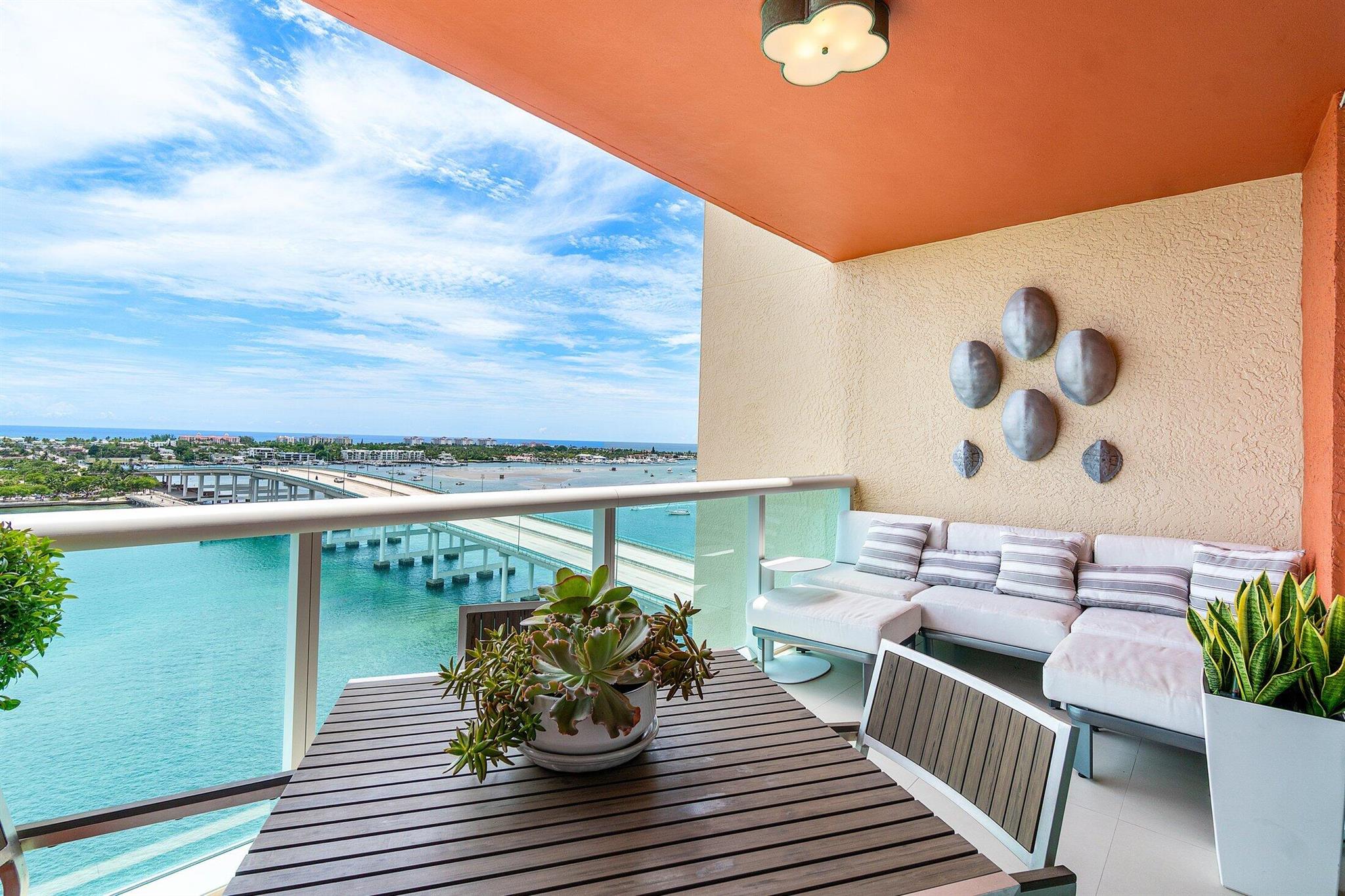 Amazing panoramic views from 14th floor, direct east facing Intracoastal & ocean view! Extensive remodel w/ high end finishes ... imported wallpaper, quartz kitchen, porcelain tile floors throughout living areas, fabulous redesigned primary bath w custom linen closet. Split floor plan, 2BR, 2.5BA, oversized showers, wool carpet in bedrooms, California closets, stacked new full size LG washer & dryer. Assigned parking, temperature controlled storage, 24/7 manned gate, valet, tennis, pickleball, Bocce, waterfront walking path w/gazebo, rooftop oasis w/pool, spa, BBQ areas, clubhouse, billiard room & fitness center. Adjacent marina w/dry docks, nearby ocean access, no fixed bridges! Minutes to the Beach, Airport, Restaurants & Shop