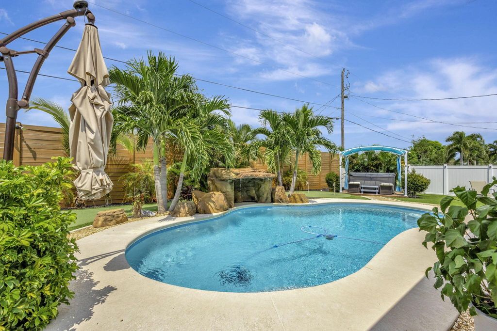 Photo of 971 SW Jasper Avenue, Port Saint Lucie, FL 34953 (MLS # R11122701)