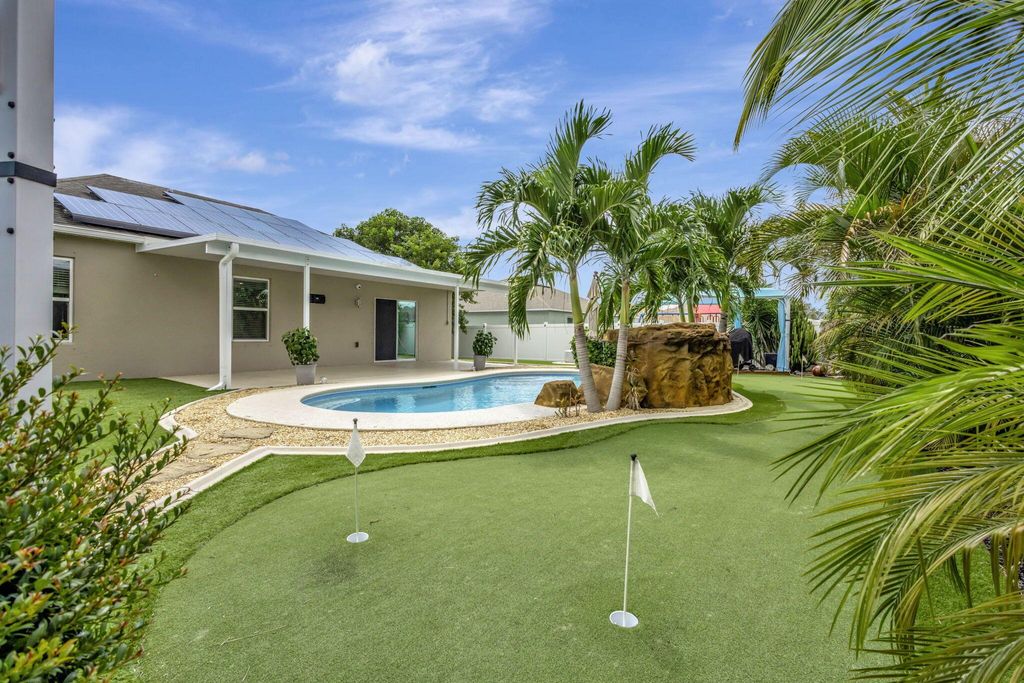 Photo of 971 SW Jasper Avenue, Port Saint Lucie, FL 34953 (MLS # R11122701)