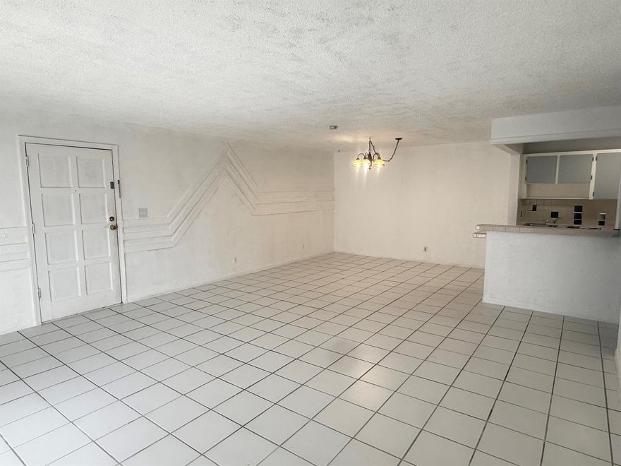 Oversized 2-Bedroom Condo in the Heart of Coral Springs!  This apt. has an open kitchen and dining room. Enjoy the convenience of a prime location near shopping, dining, entertainment, top-rated schools, and public transportation. This home features an open patio, perfect for family gatherings and weekend BBQs.