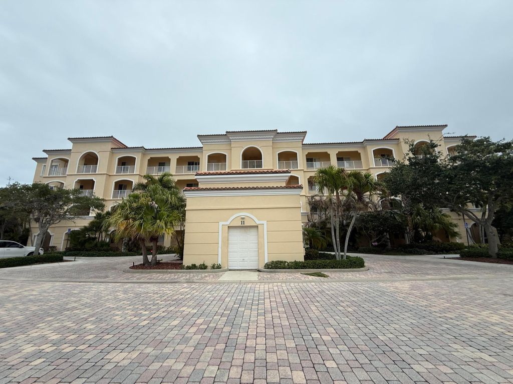 Photo of 11 W Harbour Isle Dr Dr W #105, Fort Pierce, FL 34949 (MLS # B26023398)