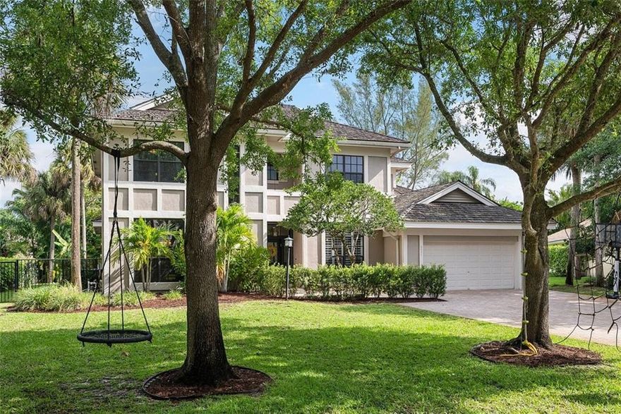 Simply a beautiful home with a fabulous a Florida design and modern farmhouse influences. The fresh and light interior is drenched in natural light giving it a bright and airy feel. The jaw-dropping crisp white kitchen with a very large island takes center stage in the open & spacious family room/kitchen area. Sublime primary suite with spa like bathroom is recently updated. The backyard is a prime spot for relaxing with a pool, summer kitchen, outdoor living areas and a sprawling lawn. Adding to the splendor of the home is its location in a quiet tree-lined cul de sac featuring impressive homes. Other offerings: most impact windows/doors, fireplace, large secondary bedrooms, wood elements, white tones & soft neutrals