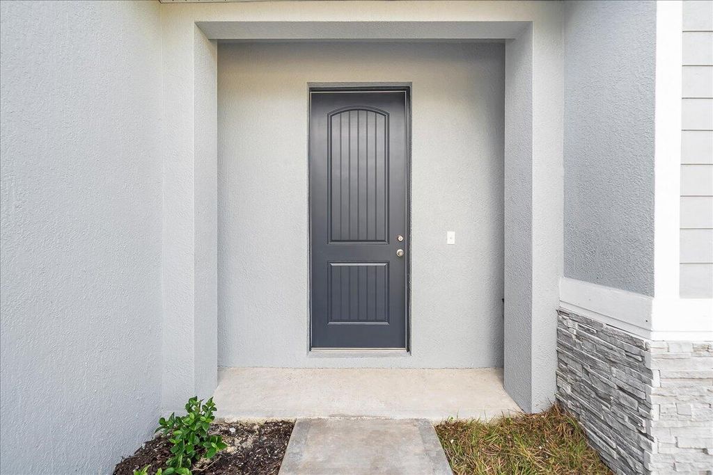 Photo of 4397 SW Gagnon Road, Port Saint Lucie, FL 34953 (MLS # R10959188)