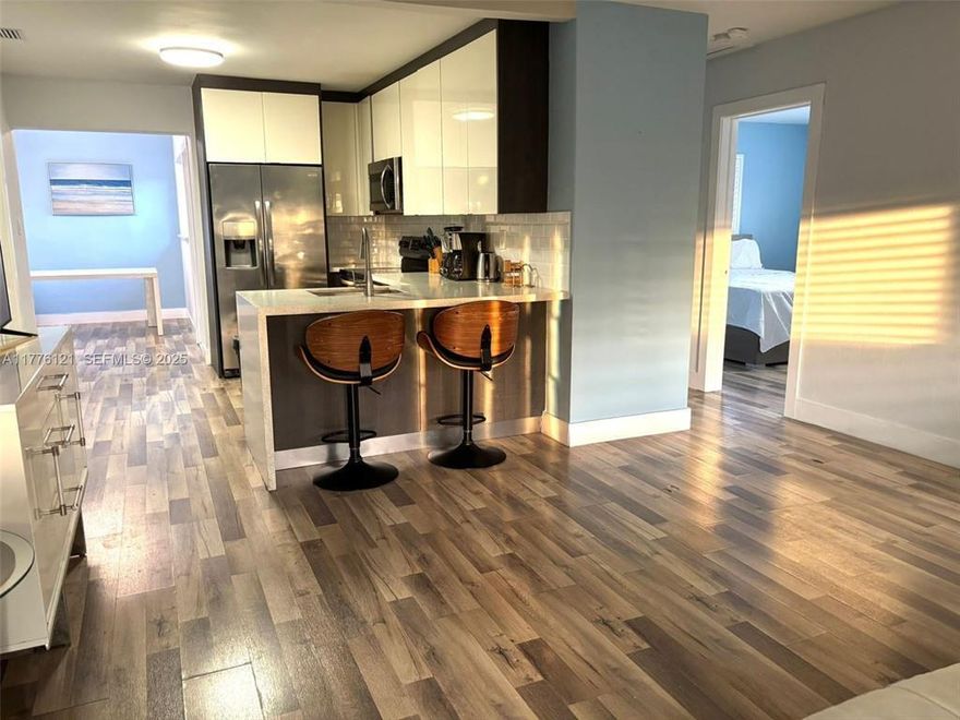 This Florida charm located in the heart of Oakland Park is fully renovated 3 bedroom 2 bathroom house from top to the bottom! Hurricane impact windows, doors This house has everything you need!  Fully equipped stunning European kitchen, living room with lather couch, bar chairs and ROKU 55"TV .Dining room to accommodate 6 people .Laundry room with new washer and dryer . Beautiful outside patio for morning coffee or afternoon happy hour. Conveniently located in close proximity to Funky Buddha and other restaurants, 10 min away from Lauderdale by the Sea, beach access and great variety of restaurants. 15 min away from Downtown Fort Lauderdale.