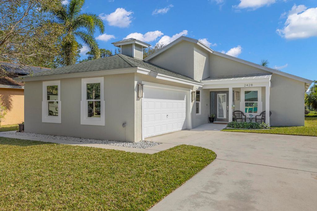 Photo of 2428 SW Plymouth Way, Stuart, FL 34997 (MLS # R10867916)