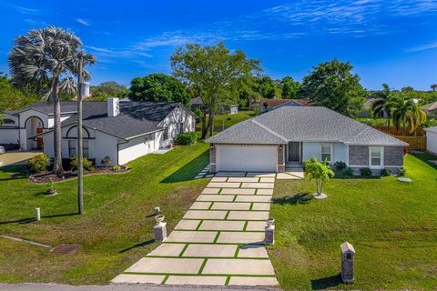 Photo of 2372 SE Maslan Avenue, Port St Lucie, FL 34952 (MLS # R11135707) Photo of 2372 SE Maslan Avenue, Port St Lucie, FL 34952 (MLS # R11135707)