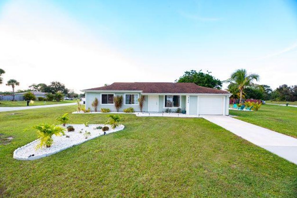 Photo of 2098 SE Talwood Lane Ln, Port Saint Lucie, FL 34952 (MLS # R10826174)