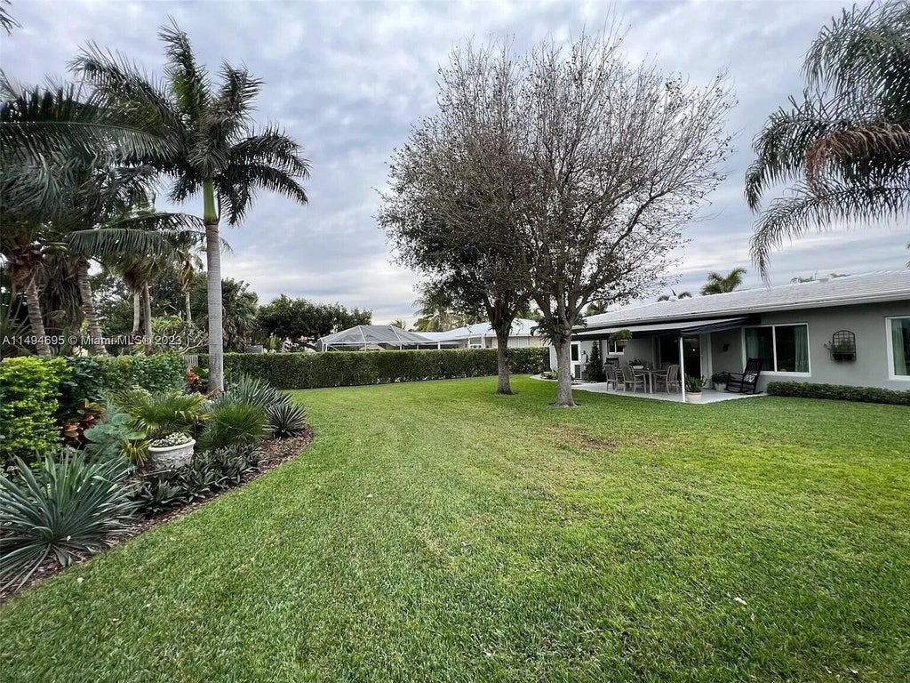 Photo of 330 Cascade Lane, Palm Beach Shores, FL 33404 (MLS # B26088348)