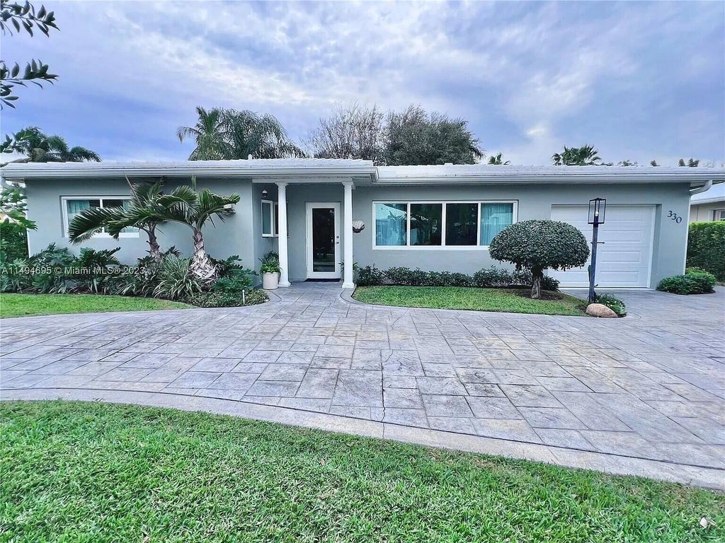 Photo of 330 Cascade Lane, Palm Beach Shores, FL 33404 (MLS # B26088348)