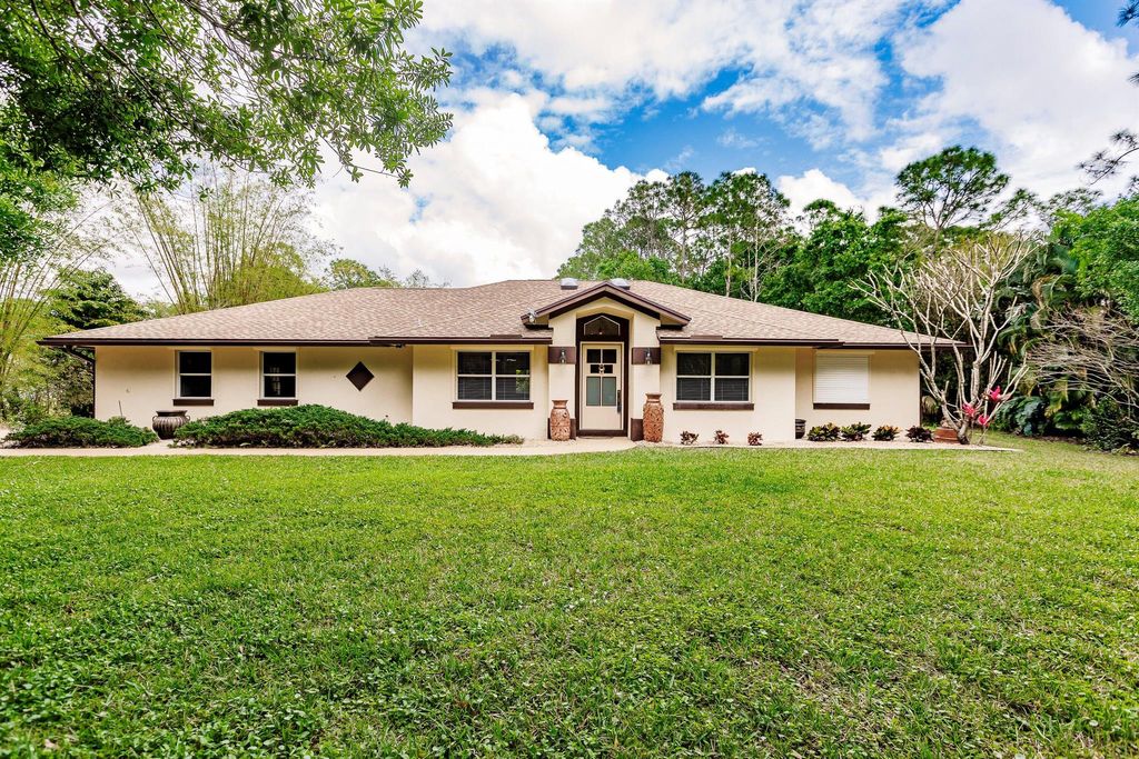 Photo of 18540 NW 126th Terrace N, Jupiter, FL 33478 (MLS # R10966273)