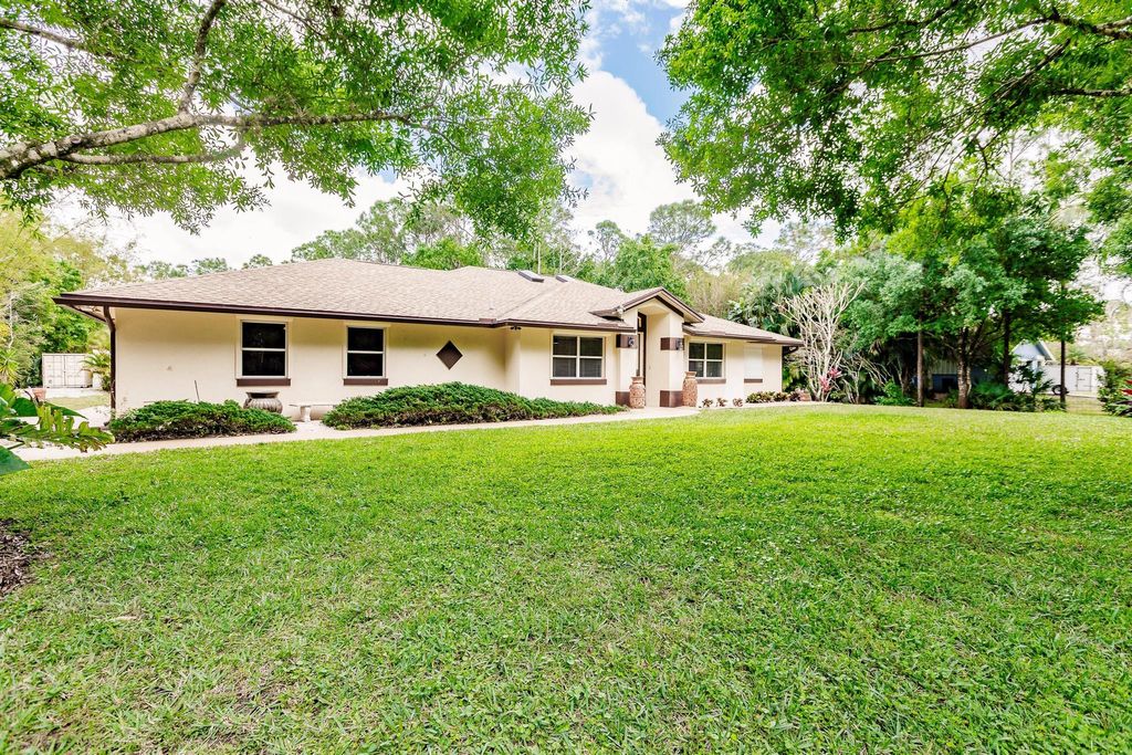 Photo of 18540 NW 126th Terrace N, Jupiter, FL 33478 (MLS # R10966273)