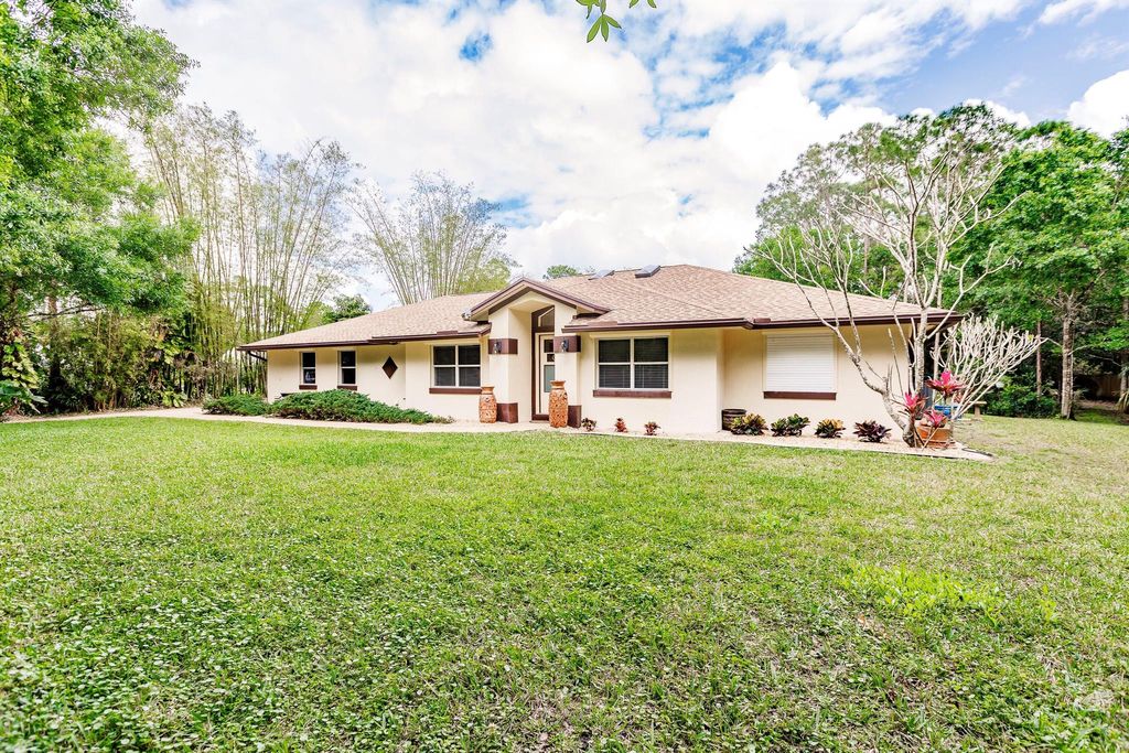 Photo of 18540 NW 126th Terrace N, Jupiter, FL 33478 (MLS # R10966273)