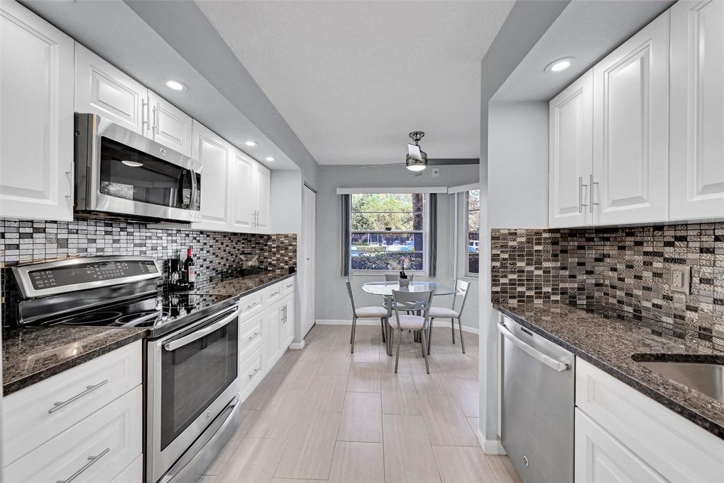 Photo of 1702 Andros Isle #E1, Coconut Creek, FL 33066 (MLS # F10548352)