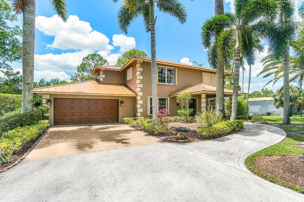 Photo of 14192 82nd Street N, Loxahatchee, FL 33470 (MLS # R11091411)