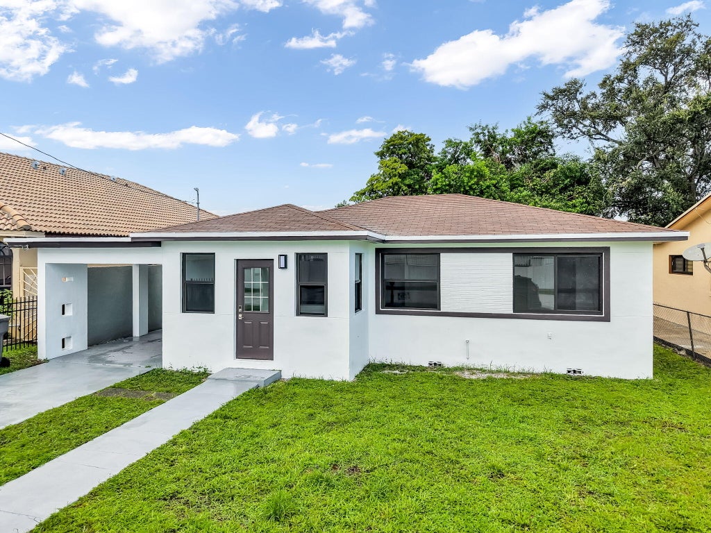 Photo of 5015 SW 25TH Street, West Park, FL 33023 (MLS # B26058098)