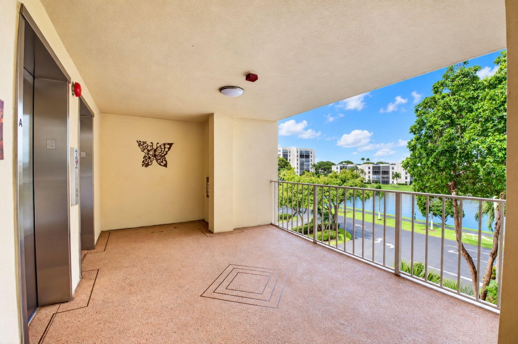 Photo of 7260 KINGHURST Drive #404, Delray Beach, FL 33446 (MLS # B26091497)