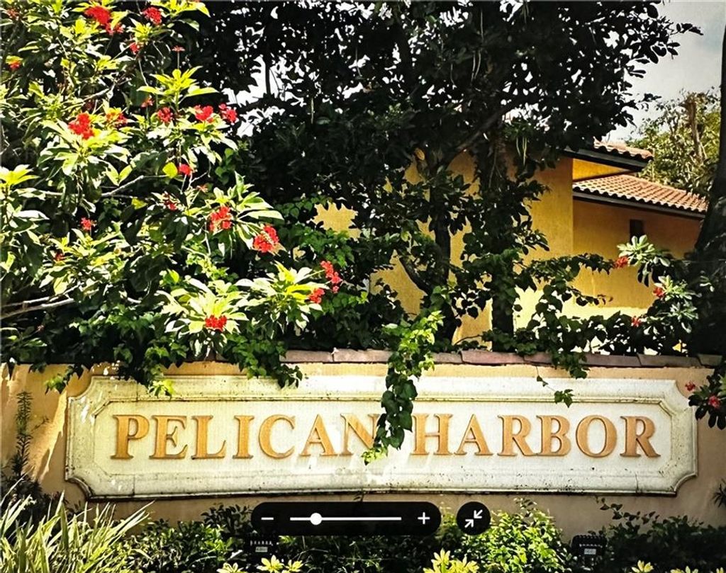 Photo of 100 Pelican Pointe Drive, Delray Beach, FL 33483 (MLS # F10376421)