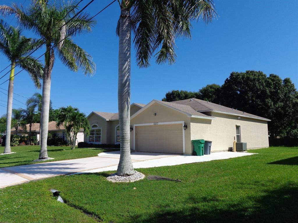 Photo of 2257 SE Baron Street, Port Saint Lucie, FL 34952 (MLS # R10751455)