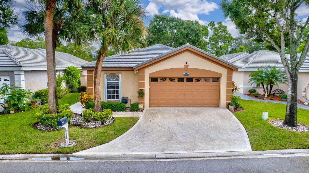 Photo of 129 Harbor Lake Circle, Greenacres, FL 33413 (MLS # R11031846)