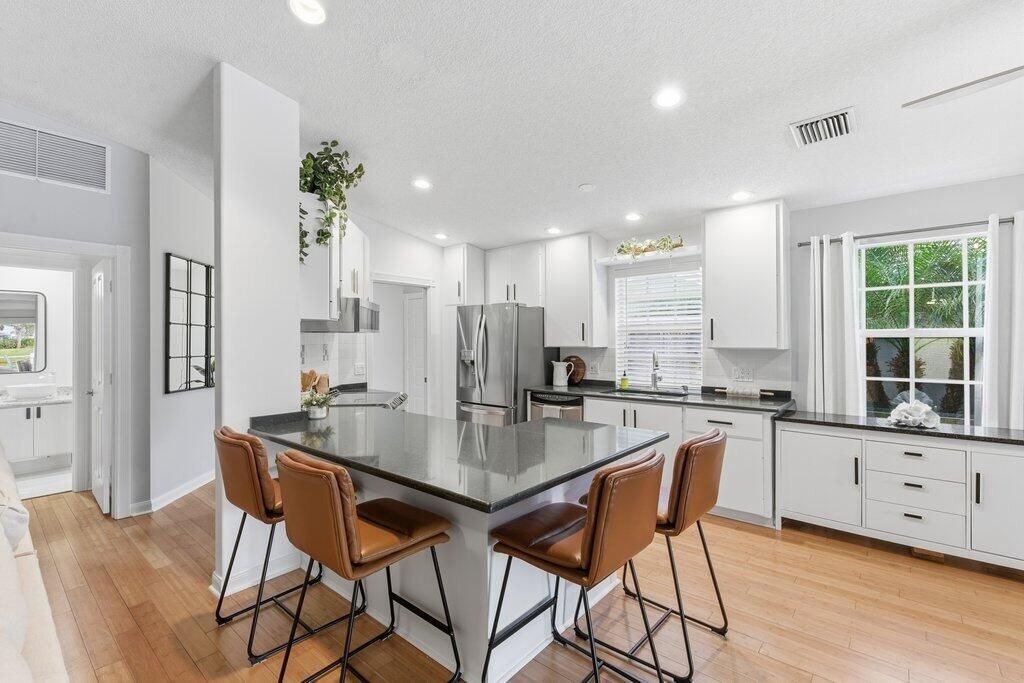 Photo of 1279 NW Bentley Circle #A, Port Saint Lucie, FL 34986 (MLS # R11141819)