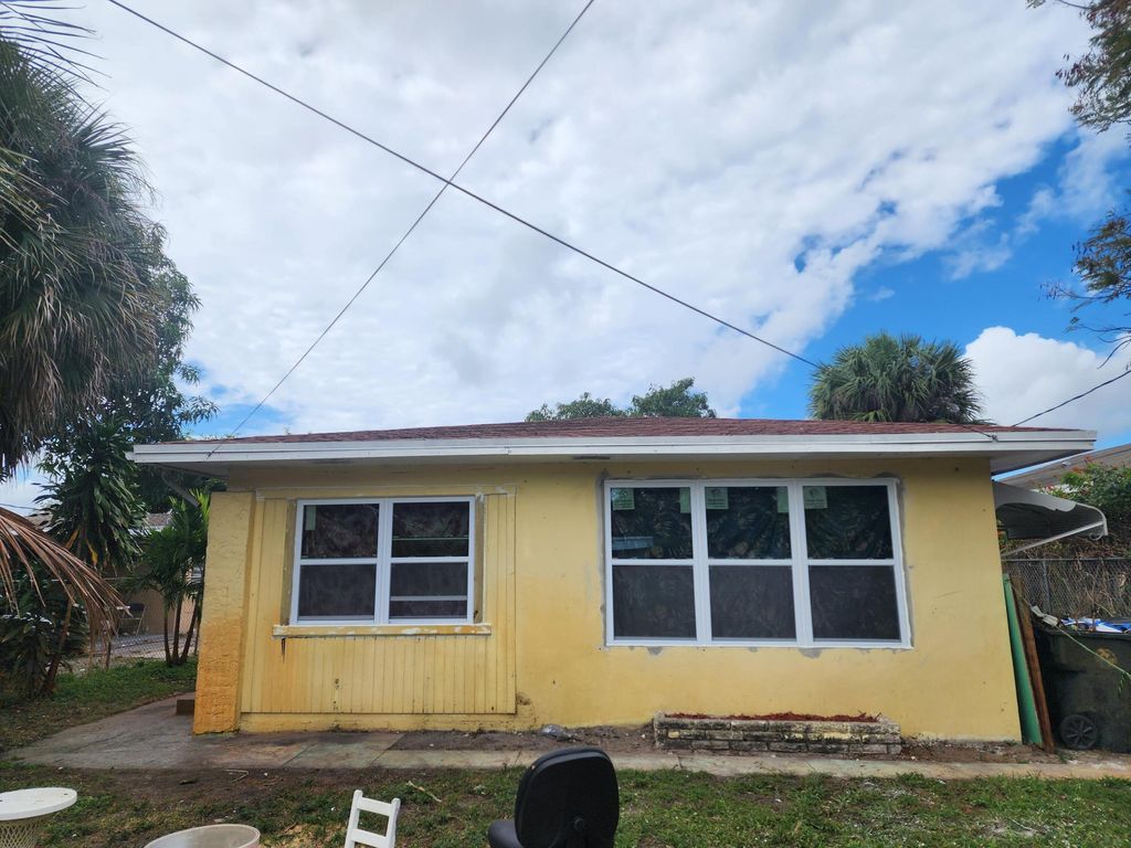 Photo of 1179 SE Proctor Lane, Port Saint Lucie, FL 34953 (MLS # R11105940)