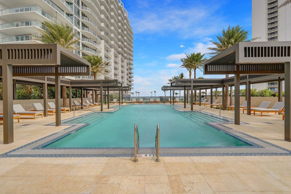 Photo of 3100 N Ocean Drive #704, Riviera Beach, FL 33404 (MLS # B26008646)