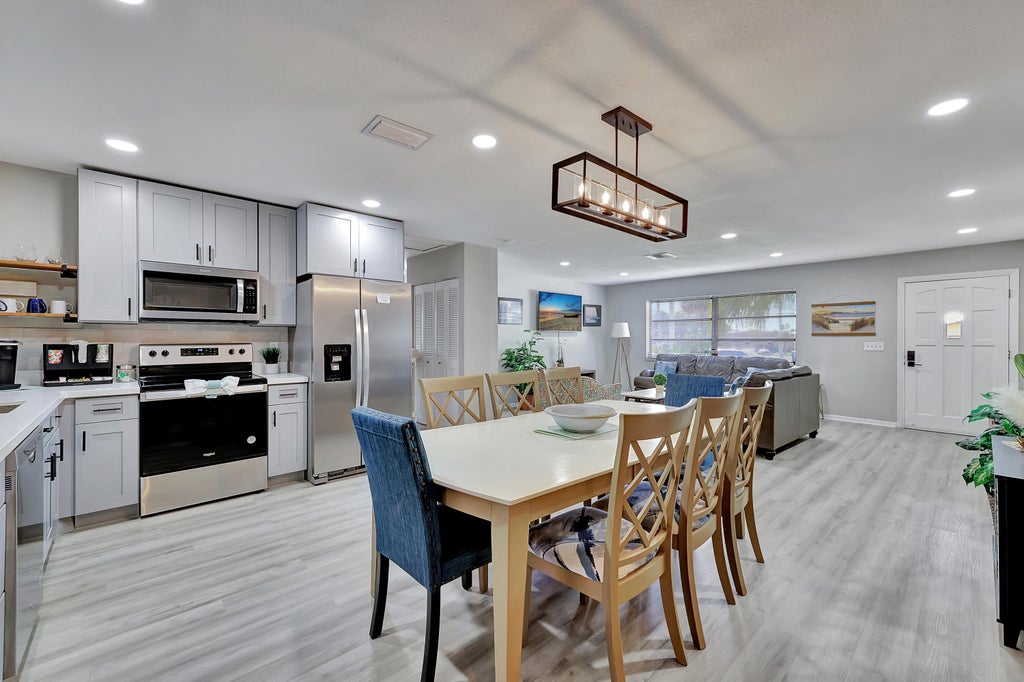 Photo of 3307 NE Jeannette Drive, Jensen Beach, FL 34957 (MLS # R11073400)