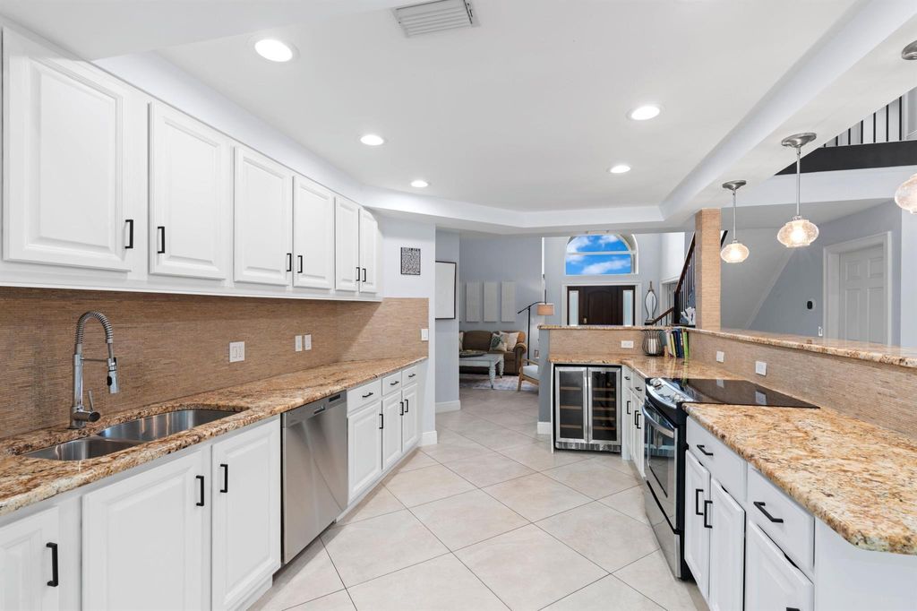 Photo of 1050 Brooks Lane, Delray Beach, FL 33483 (MLS # R10999408)