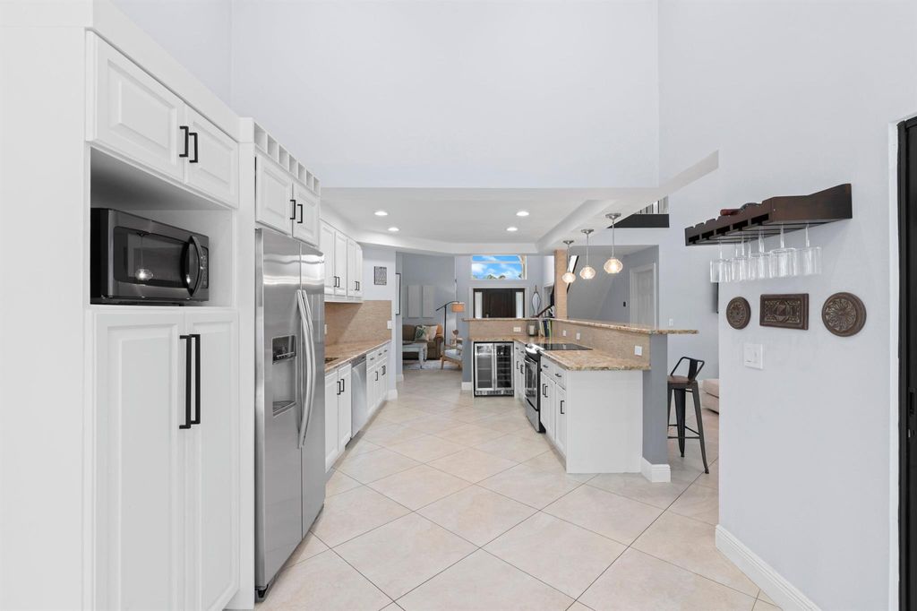 Photo of 1050 Brooks Lane, Delray Beach, FL 33483 (MLS # R10999408)