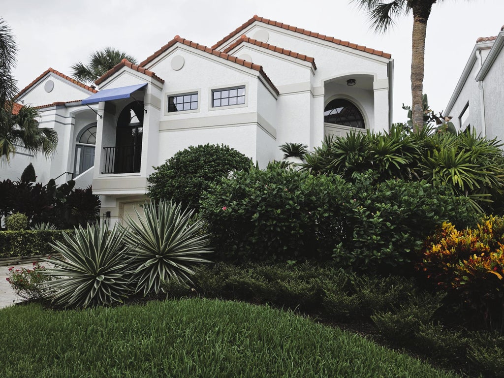 Photo of 13348 Mangrove Isle Drive, Palm Beach Gardens, FL 33410 (MLS # B26079945)