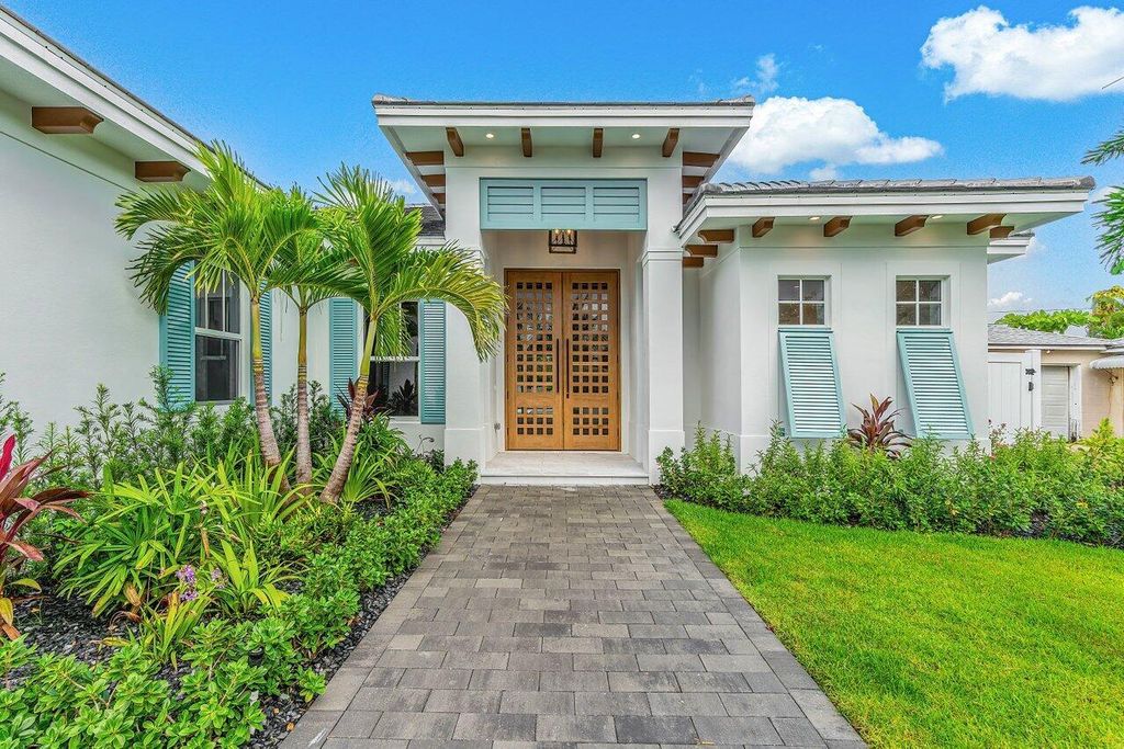 Photo of 131 Sandal Lane, Palm Beach Shores, FL 33404 (MLS # R10936385)