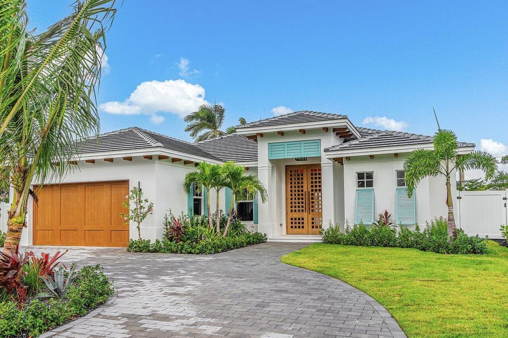 Photo of 131 Sandal Lane, Palm Beach Shores, FL 33404 (MLS # R10936385)