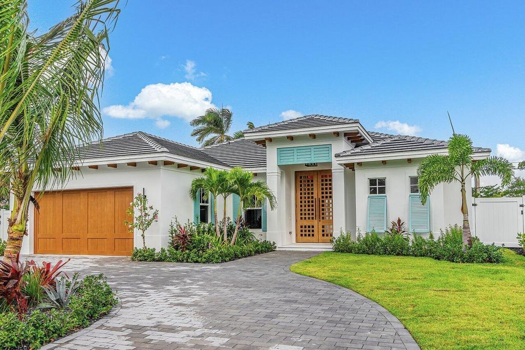 Photo of 131 Sandal Lane, Palm Beach Shores, FL 33404 (MLS # R10936385)