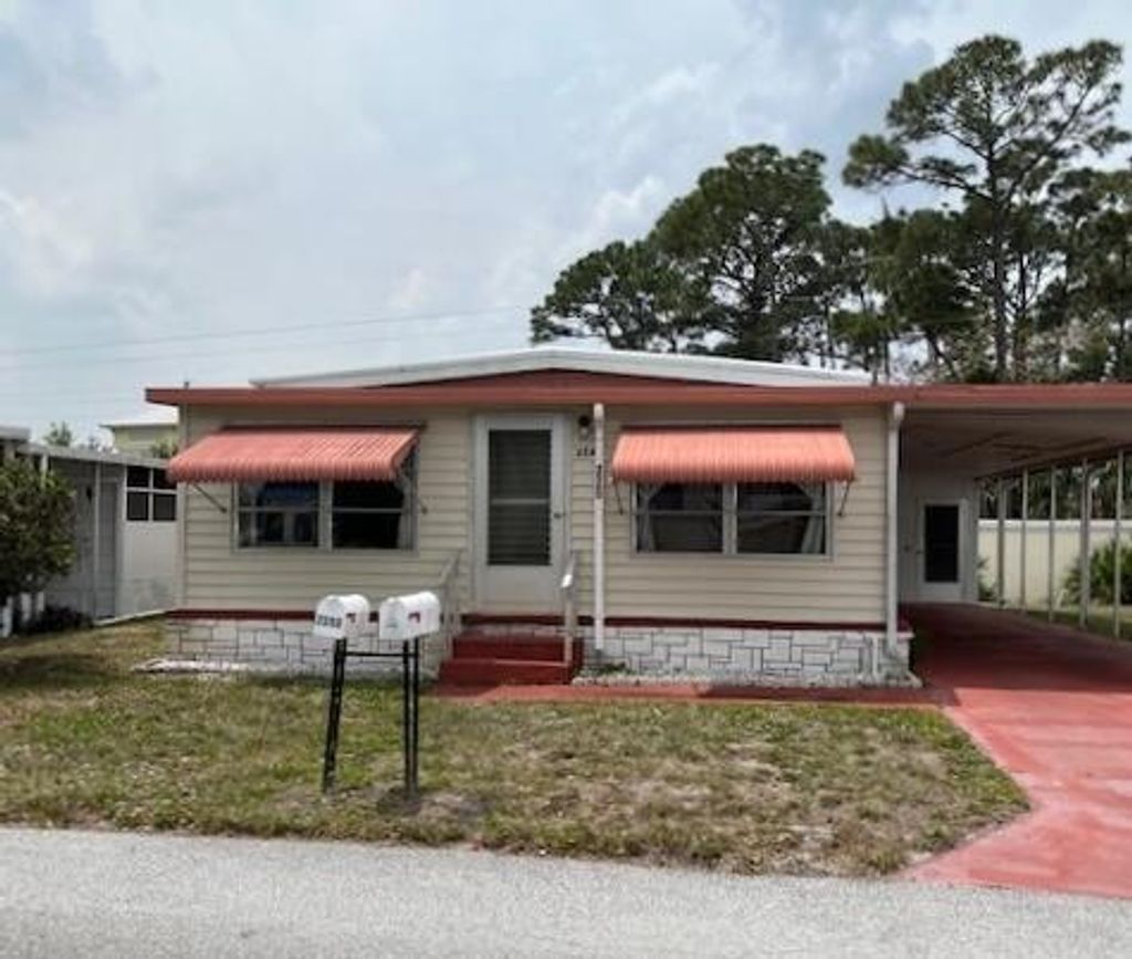 Photo of 2560 SE Penny Lane Ln, Stuart, FL 34994 (MLS # R10788839)