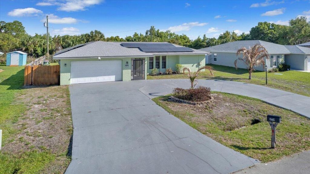 Photo of 879 SE Carnival Avenue, Port Saint Lucie, FL 34983 (MLS # B26006931)