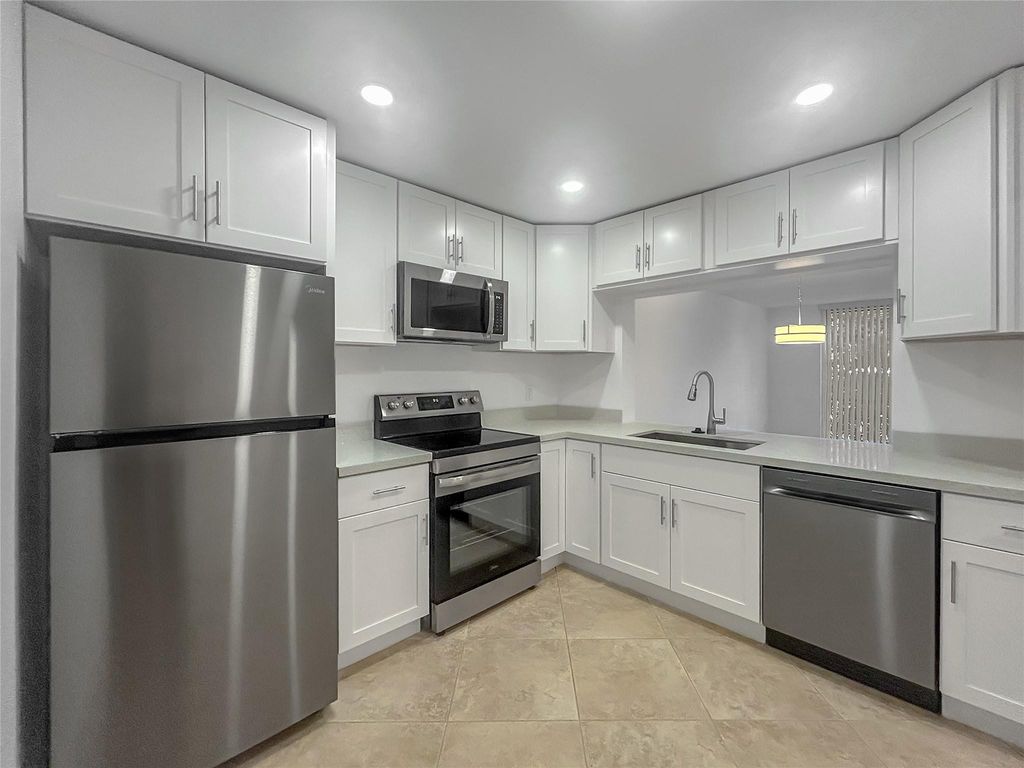 Photo of 7173 Orange Drive #103B, Davie, FL 33314 (MLS # F10504401)