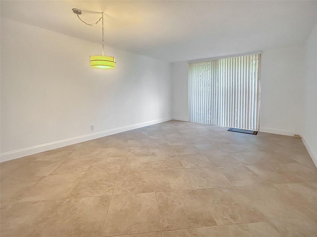 Photo of 7173 Orange Drive #103B, Davie, FL 33314 (MLS # F10504401)
