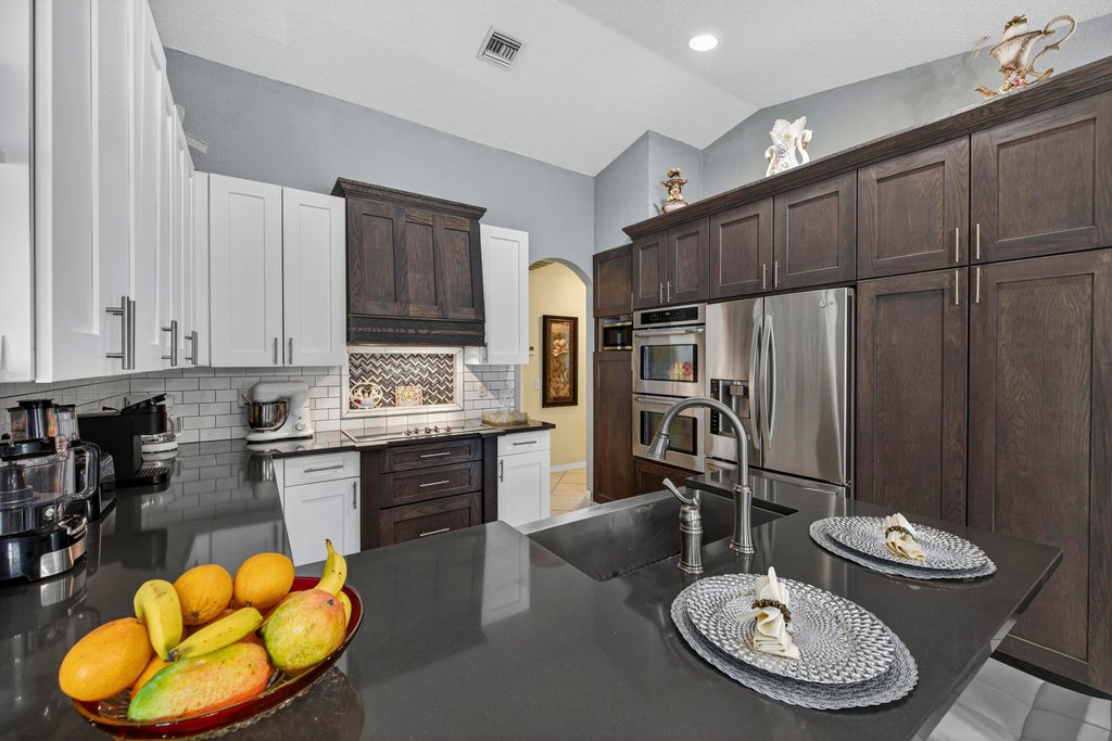 Photo of 412 SW David Terrace, Port Saint Lucie, FL 34953 (MLS # R11120498)