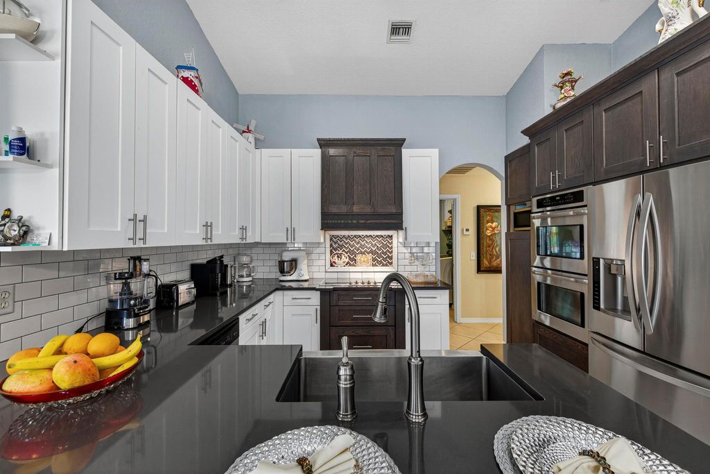 Photo of 412 SW David Terrace, Port Saint Lucie, FL 34953 (MLS # R11120498)