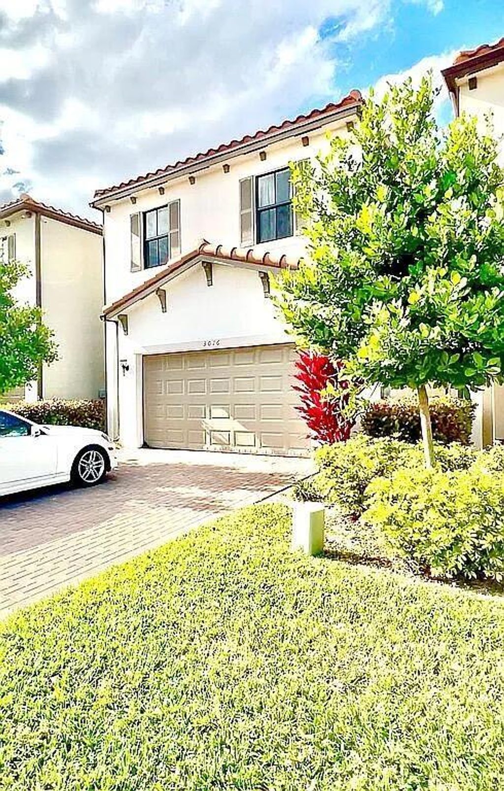 Photo of 3016 King Palm Way, Riviera Beach, FL 33410 (MLS # B26029103)