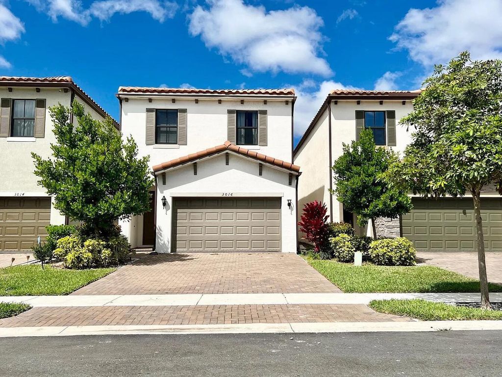 Photo of 3016 King Palm Way, Riviera Beach, FL 33410 (MLS # B26029103)