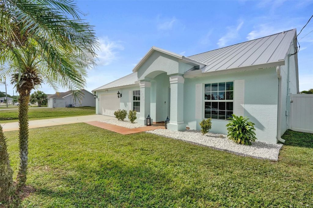 Photo of 4498 SW Attlee Street, Port Saint Lucie, FL 34953 (MLS # F10536334)