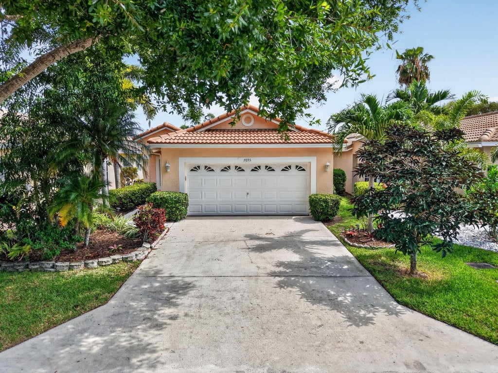 Photo of 7695 Cherry Blossom Way, Boynton Beach, FL 33437 (MLS # B26043846)