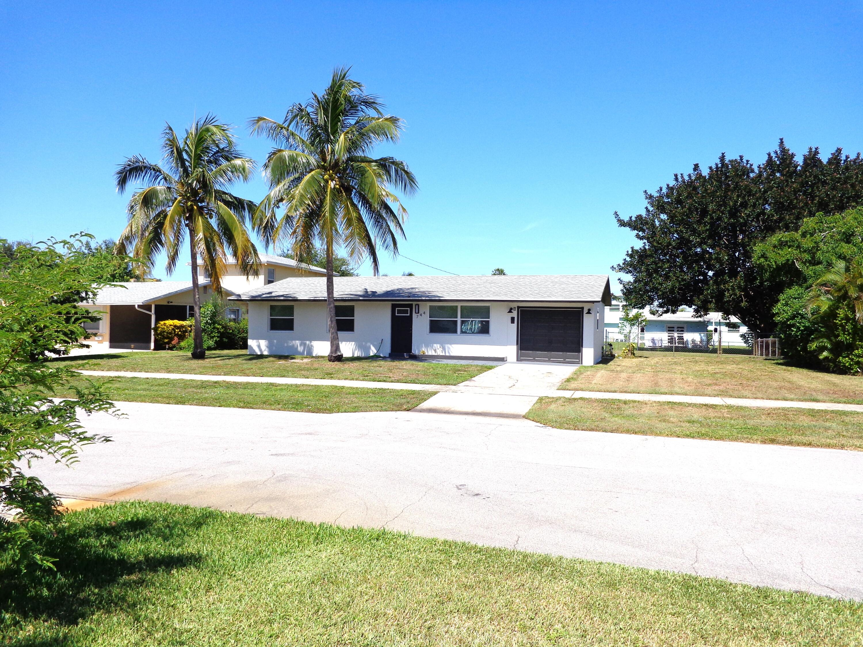 Don't Miss Out on this opportunity to rent this single-family 3/2 home in this Charming, highly sought-after Village of North Palm Beach. Features include: upgraded kitchen and bathrooms, lighted remote control ceiling fans in all rooms, an Open, light, airy concept living, kitchen, and dining area. Timeless terrazzo flooring throughout. French doors to a screened porch leading out to a spacious fenced- in back yard. The garage has an additional utility area with a washer, dryer, and an extra refrigerator with an ice maker. Conveniently located to Gardens Mall, Restaurants, Shopping, banks, and many other attractions. Also, only minutes away from the beautiful pristine Florida beaches.